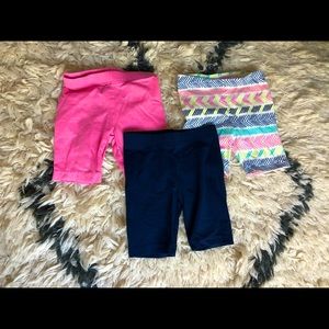 3 Playground shorts in various colors